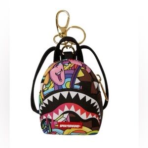 Sprayground tripping daily keychain backpack